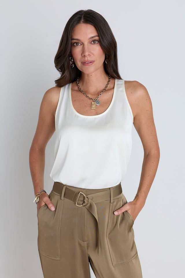 The Kay Silk Top in pearl, a sleeveless satin top with a scoop neckline