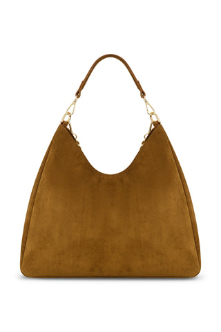 The Tribeca Chain Suede Bag - Cognac features brown suede, a single short handle, gold hardware, and a simple curved design. Its soft, structured shape is highlighted by an elegant gold chain detail.