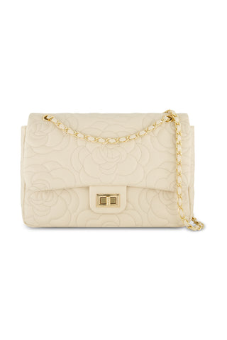 The Alessia Rose Embossed Leather Bag - Pearl features a cream hue, quilted rose-embossed design, gold-tone chain strap, and a rectangular gold clasp on the front flap.