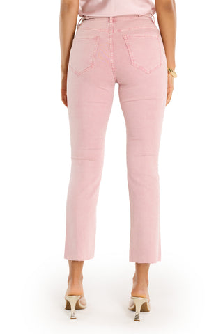 A woman, shown from the back against a white background, wears the Nicolette Cropped Jean - Blush, featuring high-waisted four-way stretch denim and beige heeled sandals.