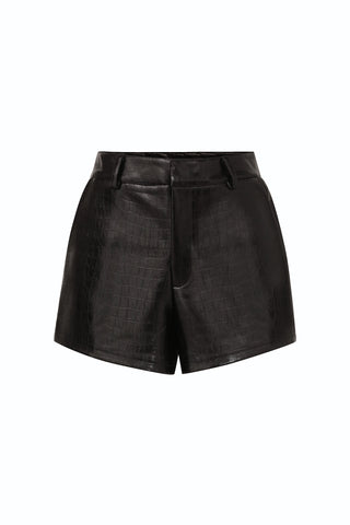 The Jaclyn Leather Short - Black showcases high-waisted, black faux croco embossed leather with belt loops, side pockets, and a front fly closure—an elevated fall short displayed against a plain white background.