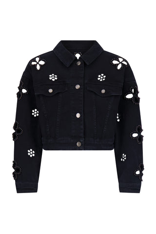 The Kaia Pearl Jean Jacket - Black features silver buttons, black embellished denim, cutout floral designs, and 3D flower appliqués on the front, sleeves, and shoulders.