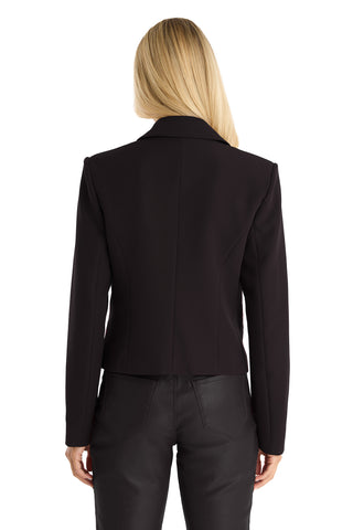 A woman with long blonde hair is shown from the back wearing a black Gabrielle Double Breasted Blazer and matching black pants against a white background.