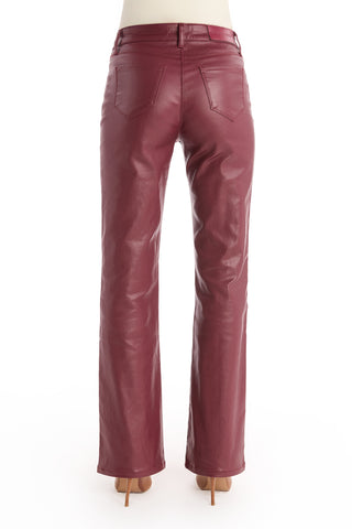 Back view of a person wearing high-rise Aria Coated Flare Jean in Merlot and beige high heels against a white background.