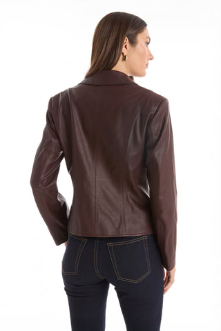 A woman with straight brown hair is seen from the back wearing the Gabrielle Leather Double Breasted Blazer in Espresso with a tailored waist and dark blue jeans, set against a plain white background.