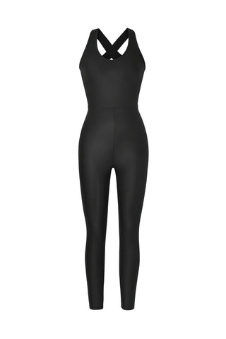 Introducing the Liquid Vixen Jumpsuit - Black Gloss, a stunning sleeveless outfit designed from liquid shine fabric. This sleek, form-fitting piece features crisscross straps at the back and offers squat-proof assurance, combining confidence and style effortlessly against a crisp white background.
