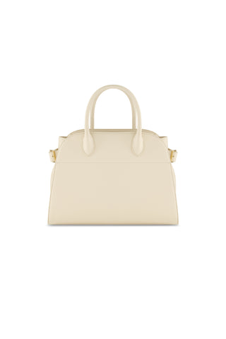 The Margo Leather Bag - Pearl is a cream-colored genuine leather handbag with top handles, gold hardware, a minimalist design, and a detachable shoulder strap. Shown against a white background.