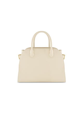 The Margo Leather Bag - Pearl features cream-colored genuine leather, gold-tone hardware, two top handles, a detachable shoulder strap, and a timeless minimalist design set against a white background.