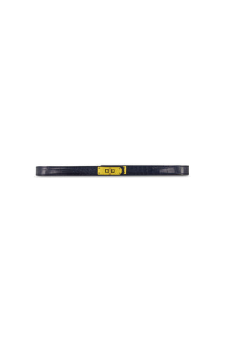 The Nicola Belt - Navy is a thin, dark blue rectangular belt with a croco effect strap and a gold lock closure in the center, displayed horizontally on a white background.