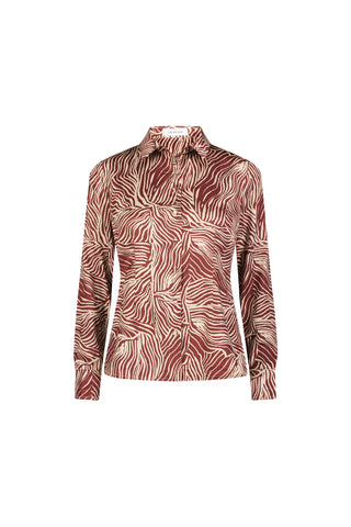 The Paulina Silk Blouse in Burgundy Zebra features a collared neck, abstract zebra print, slimming fit, and buttoned cuffs for effortless style.