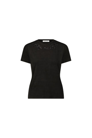 The Amaya Floral Sequin T-Shirt in black features subtle bead embellishments along the neckline and is shown on a white background.