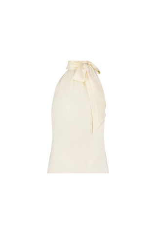 The Rina Tie Neck Blouse - Pearl is sleeveless with a high neckline and a large neck bow. Its smooth, slightly shiny fabric adds elegance and sophistication to this ivory-hued blouse.