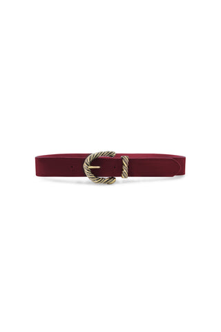 The Samantha Belt - Merlot is a burgundy leather belt featuring a large, textured gold cowboy buckle, shown against a white background.