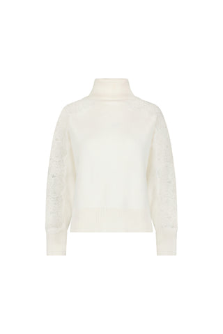 The Camille Lace Turtleneck Sweater - Pearl features lace-patterned long sleeves with ribbed cuffs and hem, shown on a plain white background.
