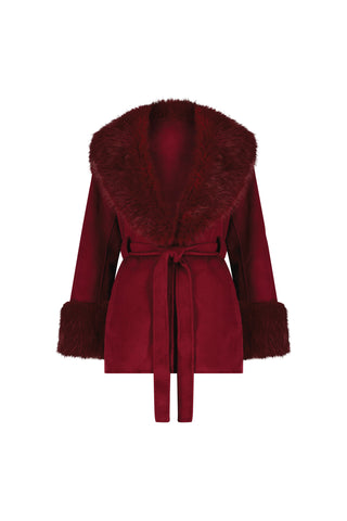 The Isabel Fur Trim Coat - Merlot features a deep red hue, wide plush faux fur collar, matching cuffs, and a self-tie waist belt for a timeless, elegant silhouette.