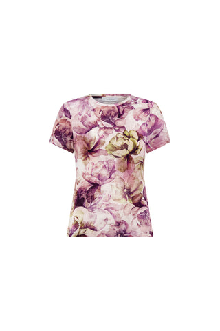 The Amaya Ultra-Soft T-Shirt - French Garden is a women’s short-sleeved tee featuring a pink and purple floral print on a white background.