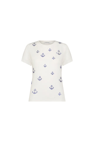 The Amaya Ultra Soft T-Shirt - Crystal Anchors features a nautical-inspired white short-sleeve design with evenly spaced small blue anchor patterns, shown on a plain white background.