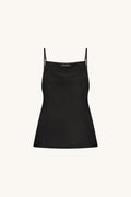 Amelie Silk Camisole in Black flat lay, black satin cowl neck camisole on a cream background
