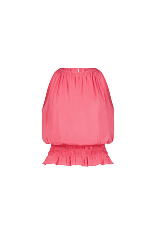 The Betsy Halter Top in Petal Pink is a sleeveless, off-shoulder blouse with an elasticated neckline and waist, adjustable ruching, and a ruffled hem. Its silky soft, loose fit is shown on a plain white background.