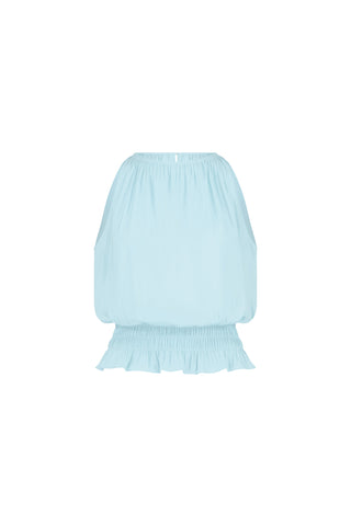 The Betsy Halter Top - Sky Blue features an off-the-shoulder, elasticized neckline and hem, loose billowy sleeves, and a ruffled bottom edge—a feminine summer blouse shown against a white background.