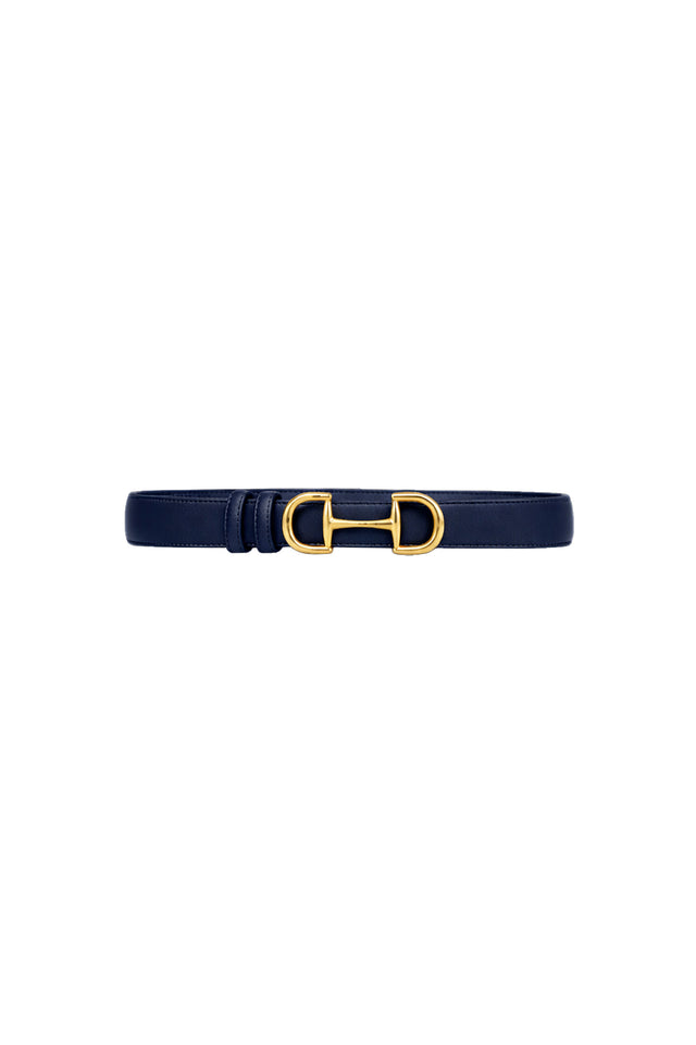 The Bettie Belt - Navy features pebbled faux leather and a gold-toned horsebit buckle, shown on a white background.