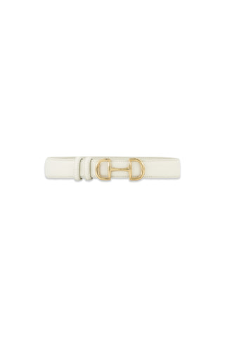 The Bettie Belt - Pearl is a white pebbled faux leather belt with gold hardware, showcasing a double D-ring buckle and a unique horsebit detail at the center.