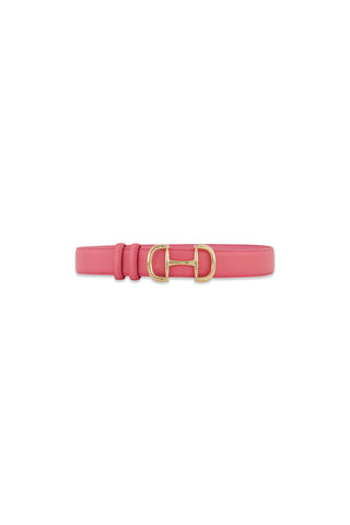 The Bettie Belt - Petal Pink is a faux leather belt in soft pink with a stylish gold horsebit buckle, shown on a white background.