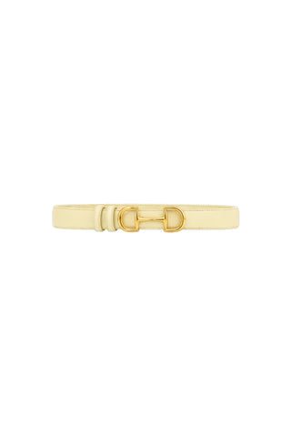The Bettie Belt - Sunshine Yellow is a slim, light yellow pebbled faux leather belt with a shiny gold-toned horsebit buckle, shown on a white background.