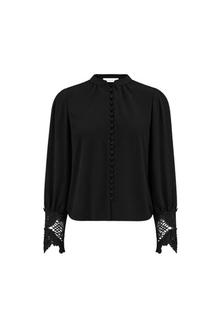 The Blake Lace Sleeve Blouse - Black features fabric-covered buttons, gathered shoulders, lace-detailed cuffs, a rounded collar, and a loose, elegant fit for timeless style.