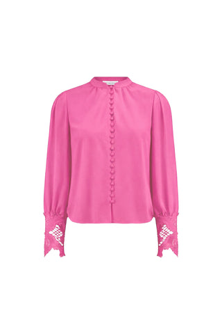 The Blake Lace Sleeve Blouse in Petal Pink features long lace sleeves, a high neckline, front buttons, and lace-detailed cuffs.