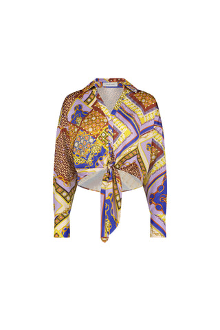 The Cecilia Silk Tie-Front Blouse - Riviera Chain features a collared neckline, long sleeves, and a vibrant gold, blue, purple, and brown patchwork with chain and geometric motifs in a stylish, slightly cropped summer fit.