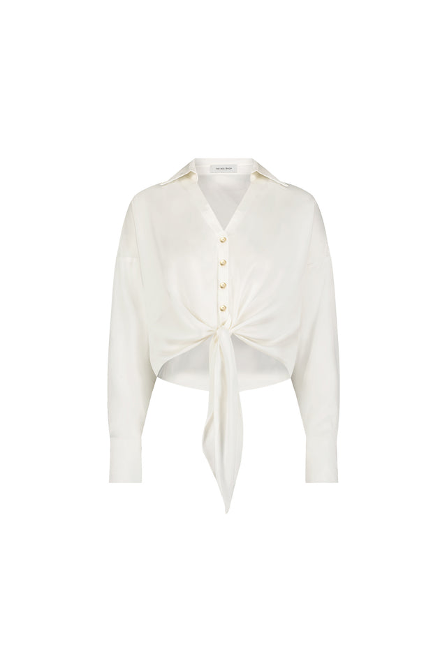 The Cecilia Silk Tie-Front Blouse in white features long sleeves, a collared neckline, front buttons, and a chic waist tie-knot, shown against a plain white background.