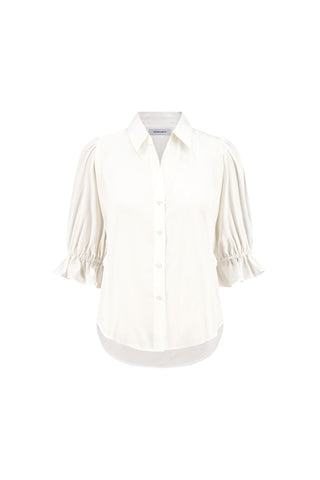 The Cindy Ruffle Sleeve Shirt in white features puffed short sleeves with gathered details, a button-down front, classic collar, curved hem, and elegant button closure for a feminine look.