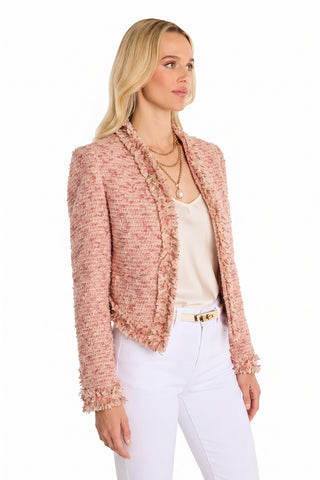 A woman with long blonde hair wears the Florence Tweed Jacket - Rose Multi, styled with a cream blouse, layered gold necklaces, and white pants. She stands against a plain white background, looking slightly to the side.
