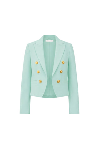 The Gabrielle Double Breasted Blazer - Mint features a tailored waist, long sleeves, notched lapels, and six gold buttons in two rows on the front, shown against a plain white background.