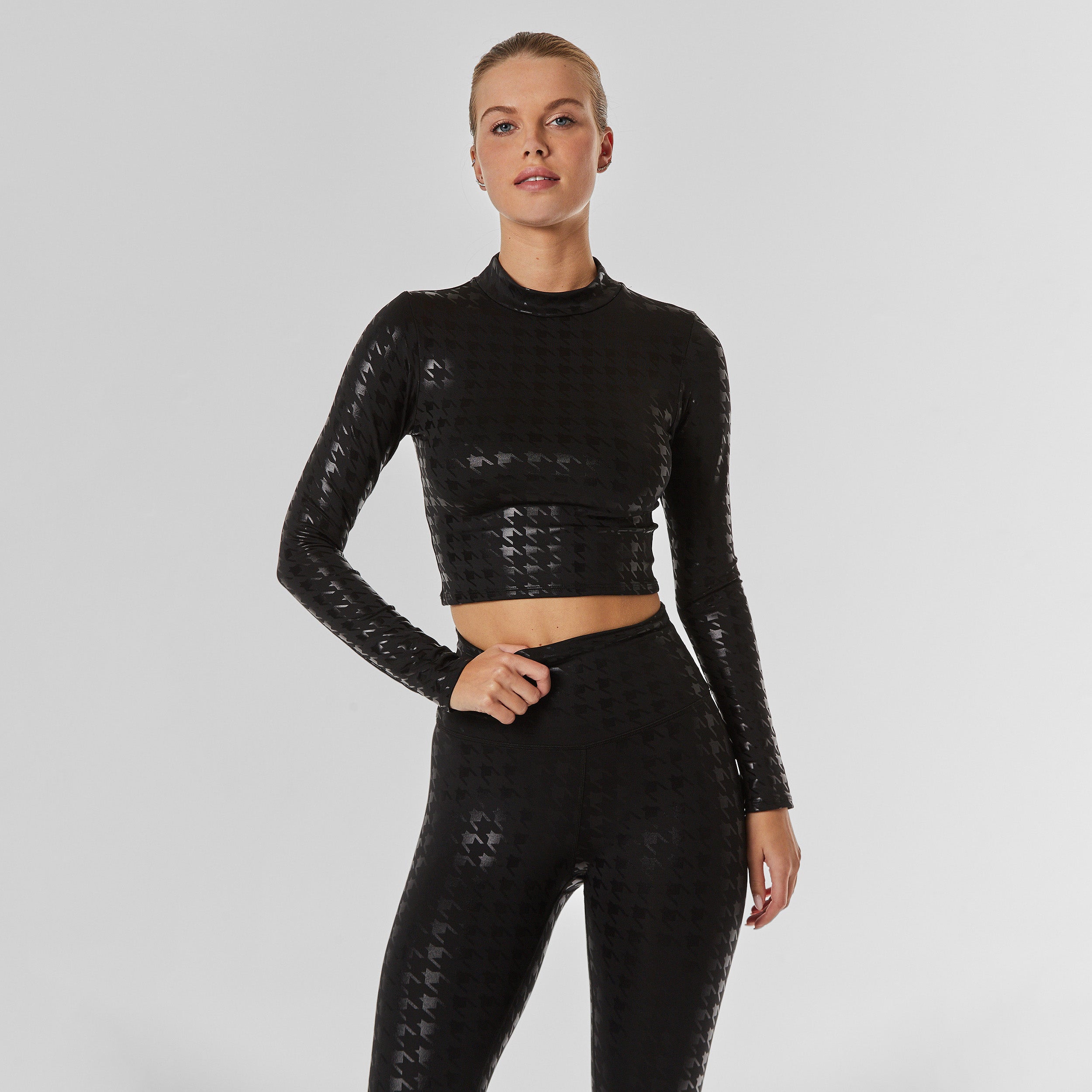 Front view of black on black houndstooth Long Sleeve top