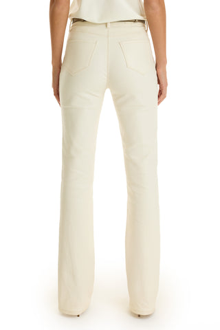 A person faces away from the camera, showing only their lower torso and legs in high-rise Aria Coated Flare Jean - Vanilla paired with a tucked-in white top.