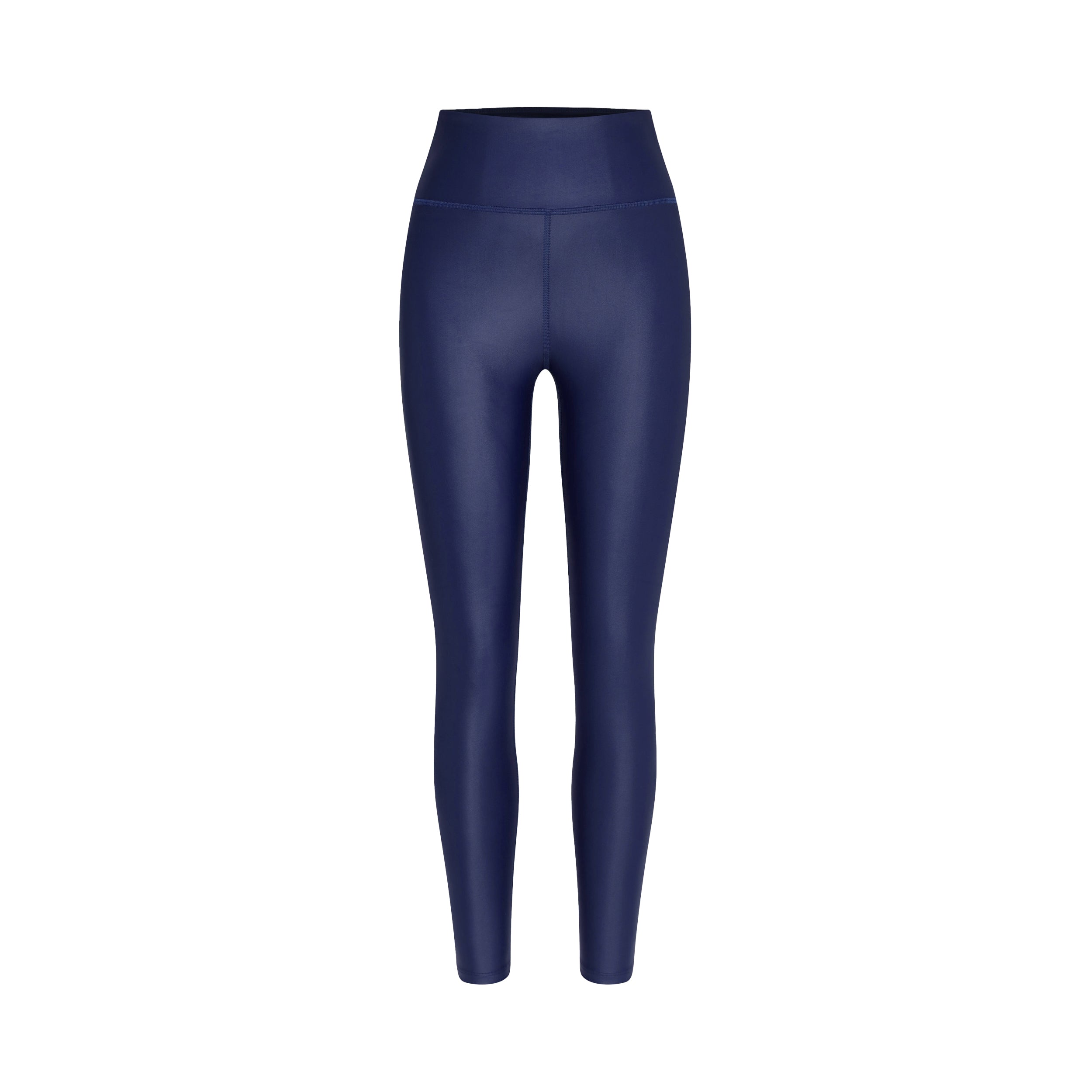 Product view of woman wearing lightweight, lustrous shine, quick drying navy blue liquid leggings