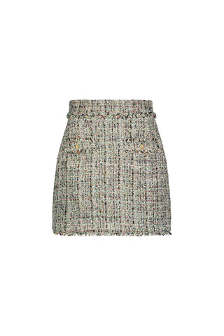 The Lisette Tweed Skirt - Teal Multi is a high-waisted, multicolored tweed skirt with a fitted silhouette, front flap pockets, and a frayed hem, exuding luxury style, shown on a white background.