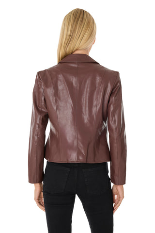 A person with long blonde hair, seen from the back, is wearing an espresso Gabrielle Leather Double Breasted Blazer and black pants against a white background.