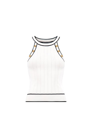 The Martha Button Halter Tank - White is a sleeveless ribbed knit top with a high neckline, black trim at the collar, hem, and armholes, and gold dome buttons along the shoulders.