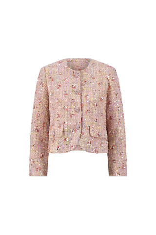 The May Tweed Crystal Jacket in Pink Multi features long sleeves, a collarless design, structured shoulder pads, decorative buttons, two front pockets, and textured fabric with white and metallic accents.