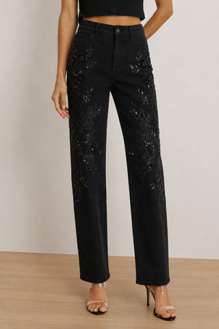 The Stassi Floral Sequin Jean in black, high-rise wide-leg denim with floral sequin embroidery