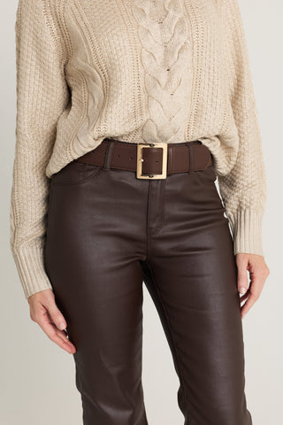 Josie Belt in Espresso styled with a cream cable knit sweater and espresso coated flare jeans, three-quarter view, The Noli Shop