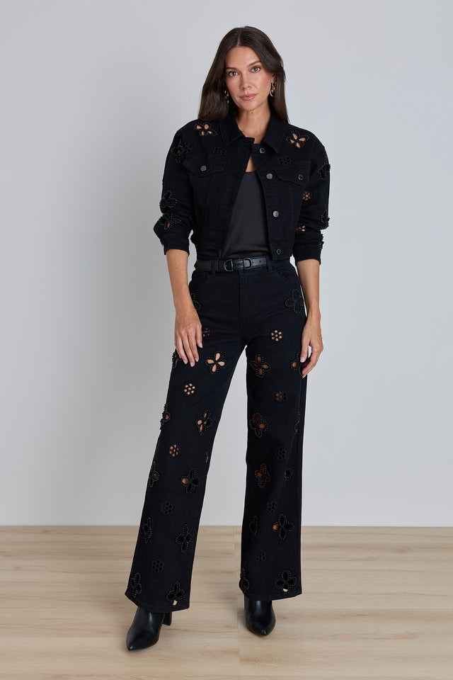 Kaia Pearl High Rise Jean - Black styled view showing the high-rise fit and daisy cutout embellishment