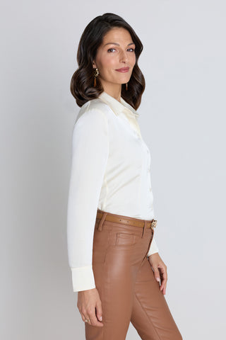 Detail of the Paulina Silk Blouse in pearl showing the collar and button placket