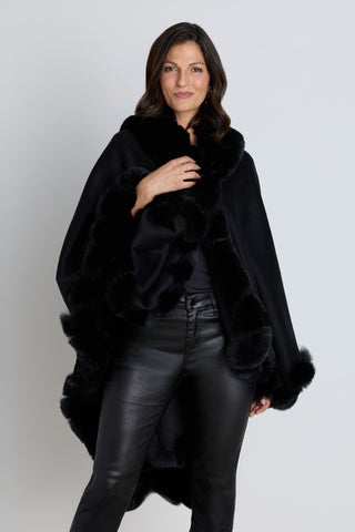 Ophelia black cape with faux fur trim, side view showing drape