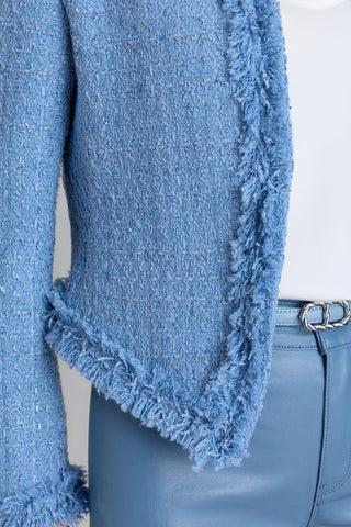 Detail of the Florence Tweed Jacket in coastal blue showing the woven texture