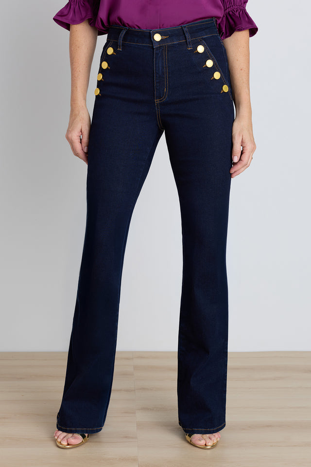 The Allegra Bootcut Jean in indigo, dark high-waisted stretch denim with gold button pocket accents
