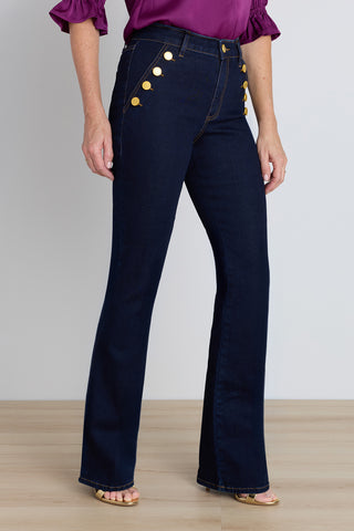 Detail of the Allegra Bootcut Jean in indigo with decorative gold buttons on the front pockets